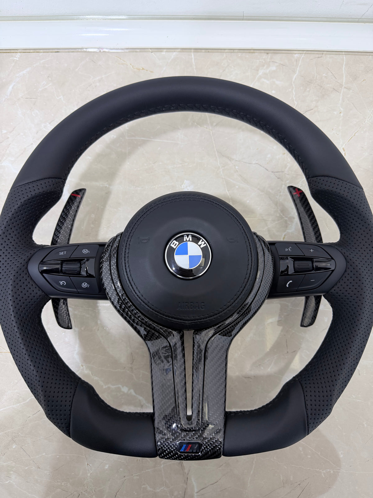 BMW F-Series Nappa leather custom steering wheel with carbon fiber center and black trim