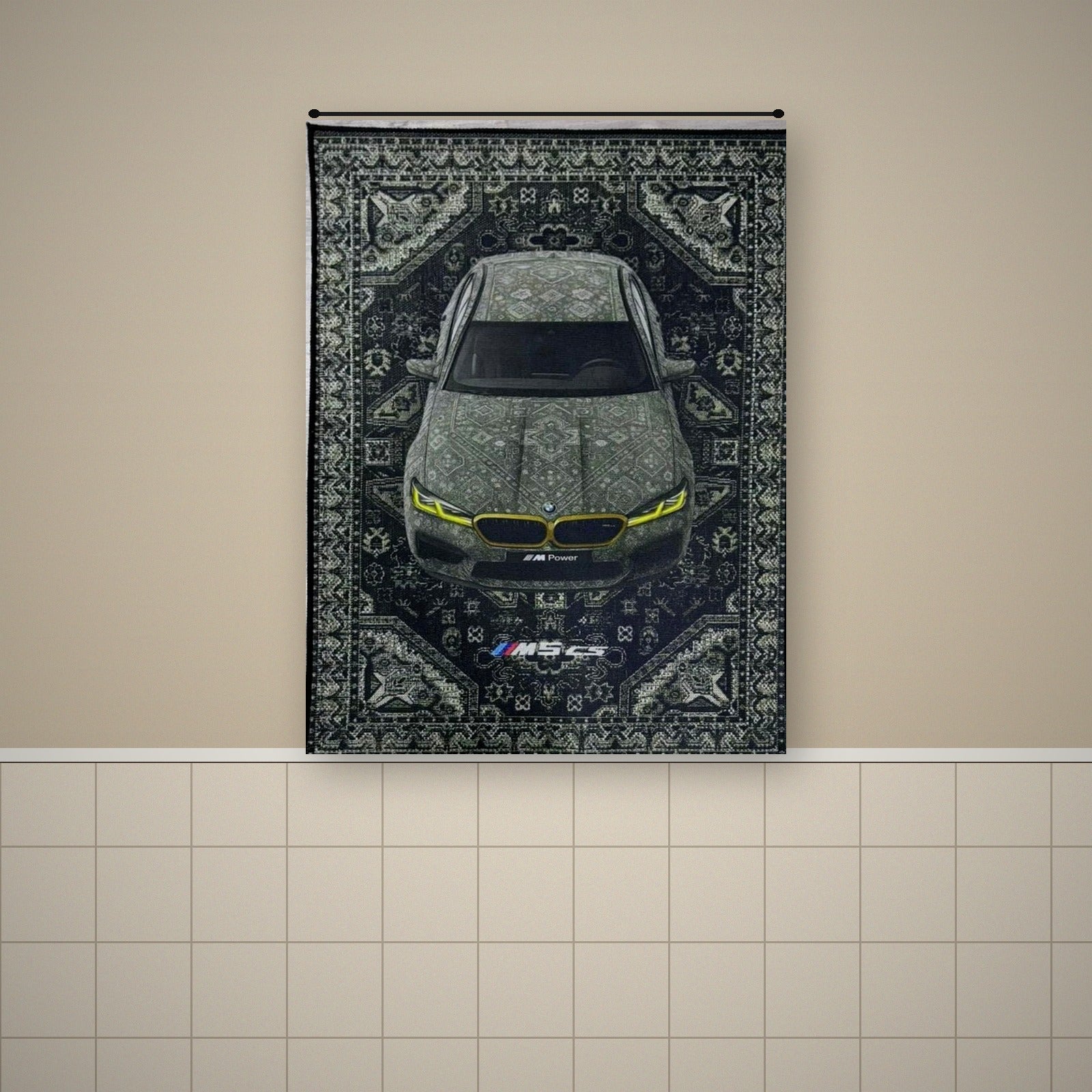 BMW M5 CS rug hung on a beige wall above a tiled floor