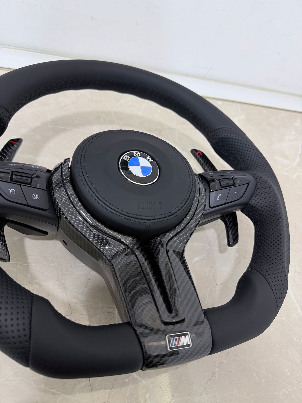 BMW F-Series Nappa leather steering wheel with carbon fiber center - side view