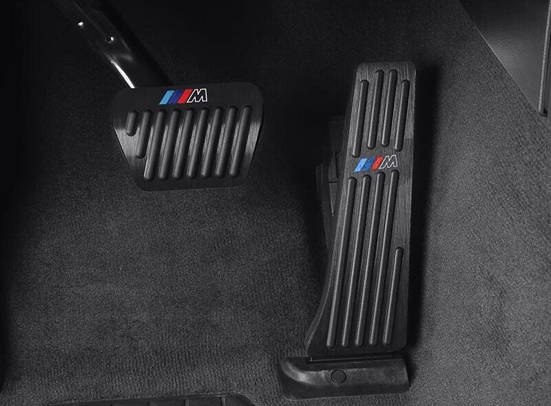 BMW M Performance pedal covers fitted in a BMW footwell