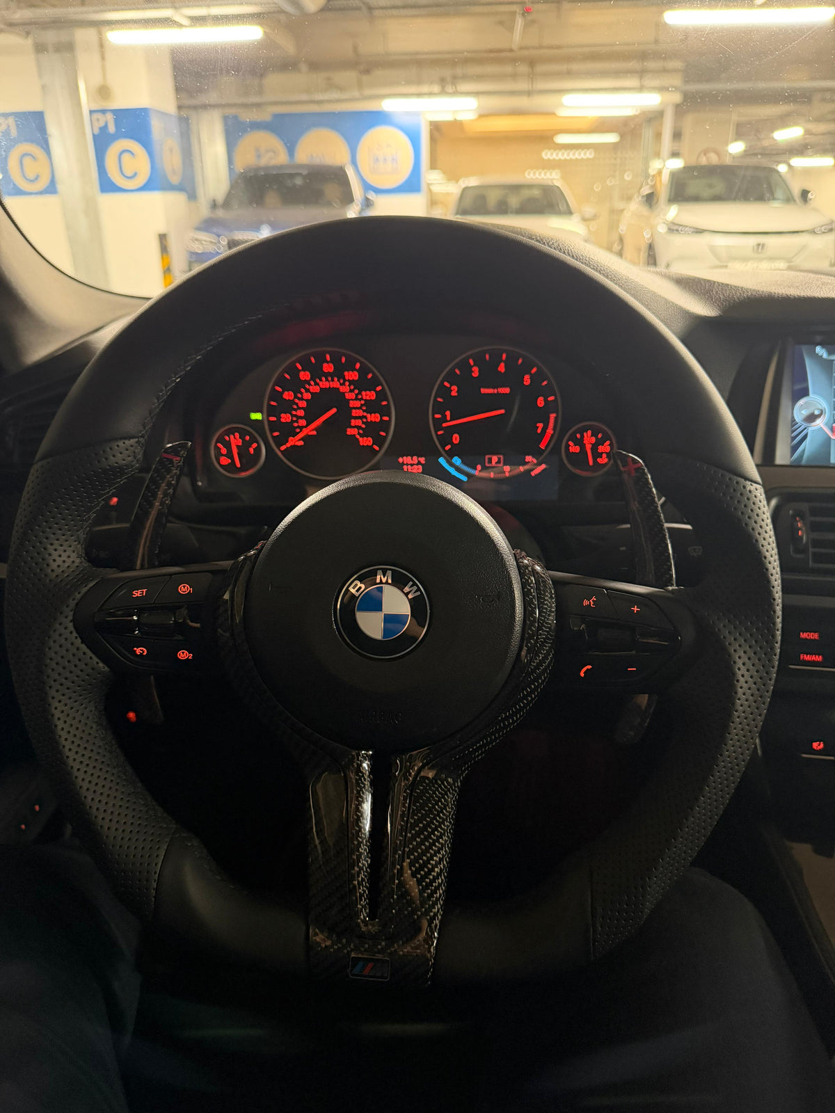 BMW F-Series Nappa leather steering wheel grip and black trim detail