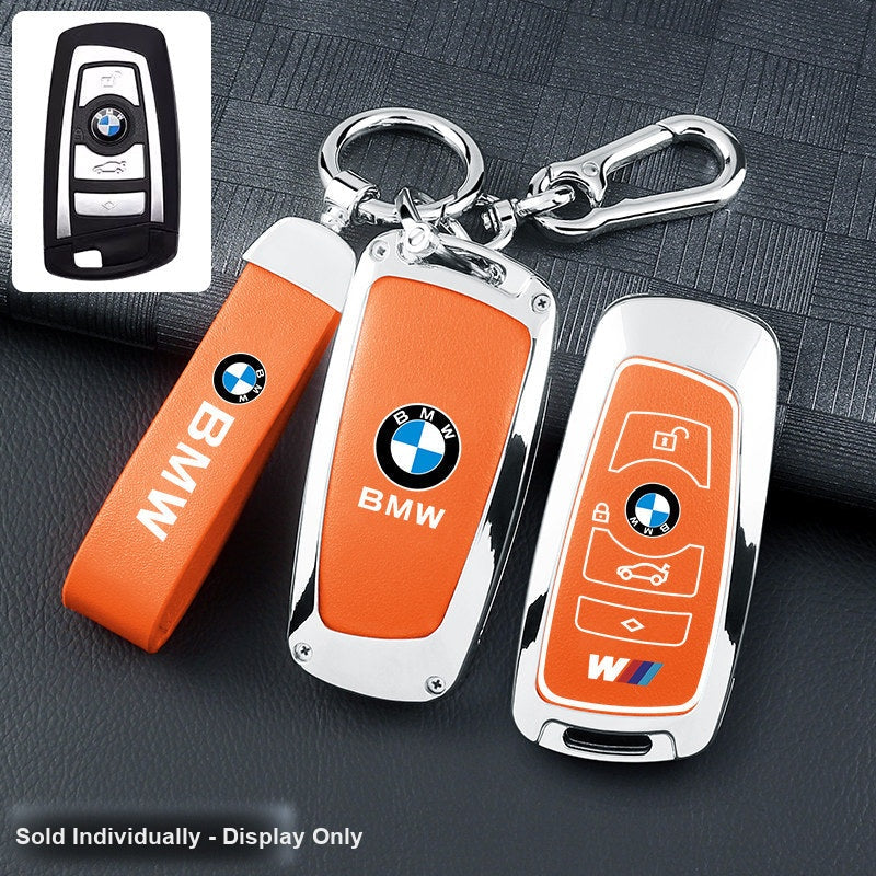 BMW key fob cover - silver frame orange leather panel with belt keychain