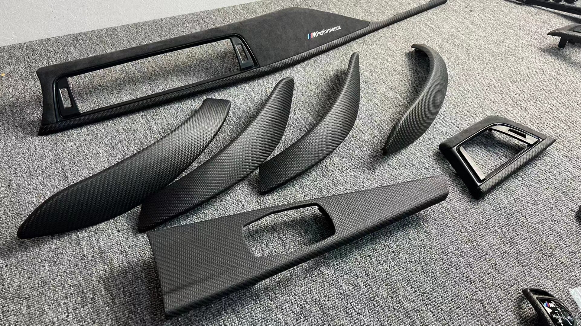 BMW F30/F35 carbon fiber interior trim set, angled view