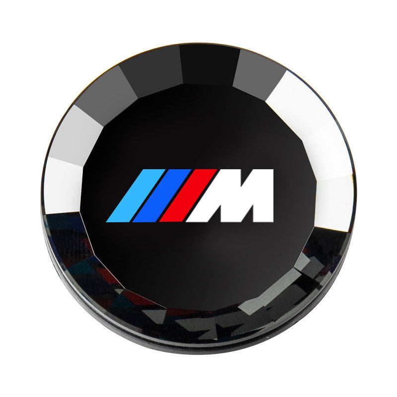 BMW M start-stop button crystal cover close-up