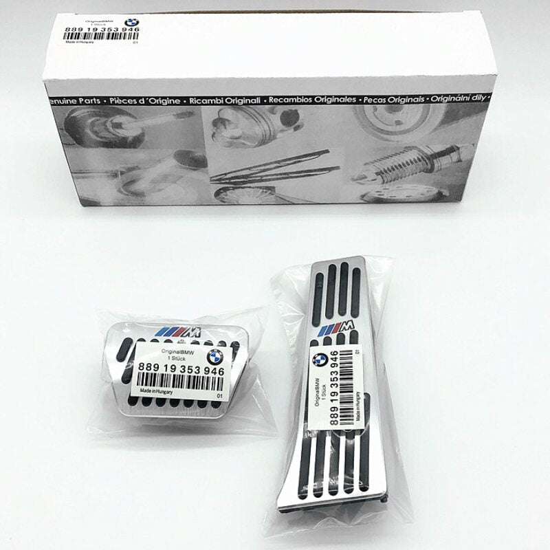 BMW aluminum pedal covers sealed in packaging with original parts box