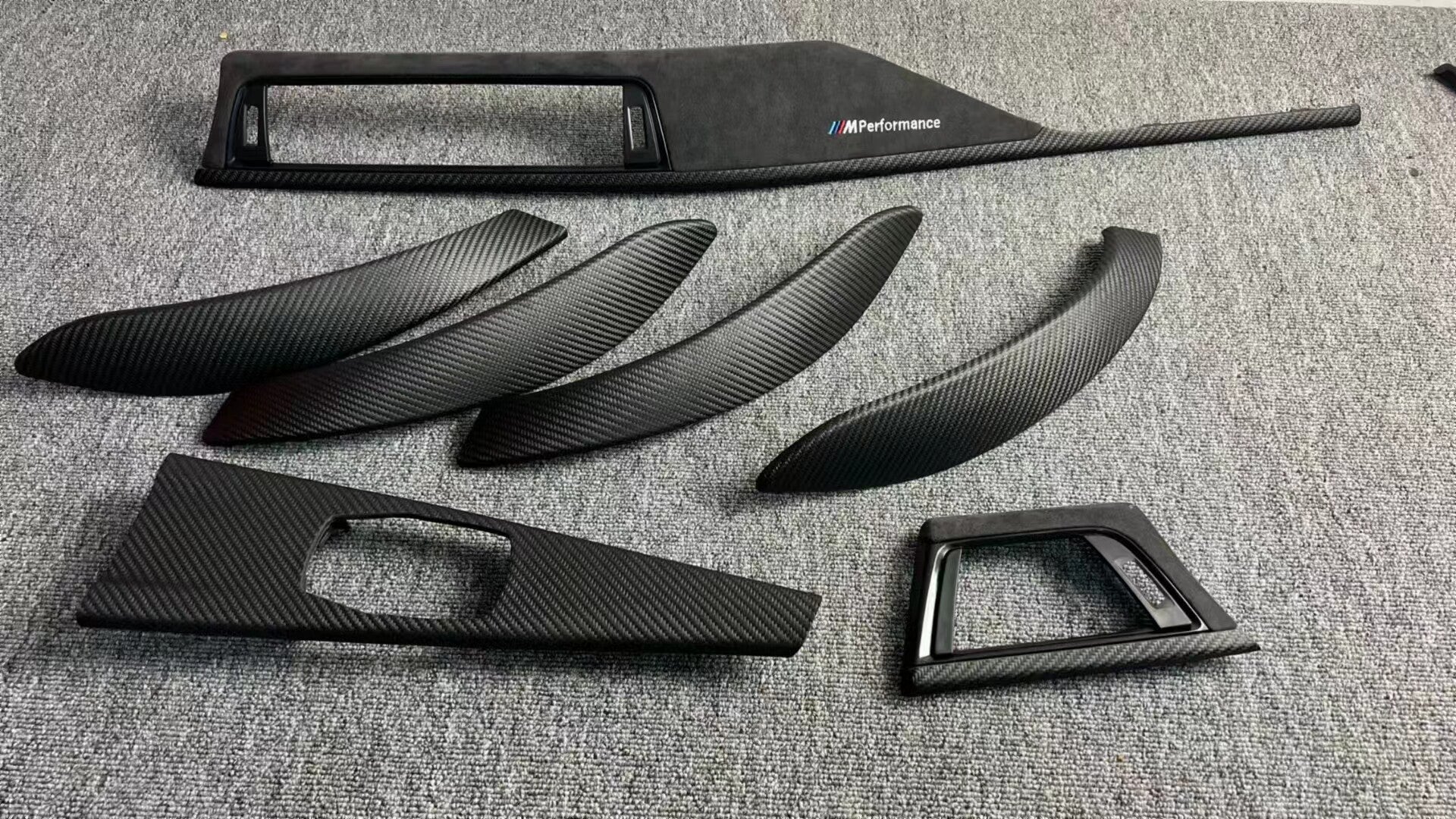 BMW F30/F35 carbon fiber interior trim full set laid out