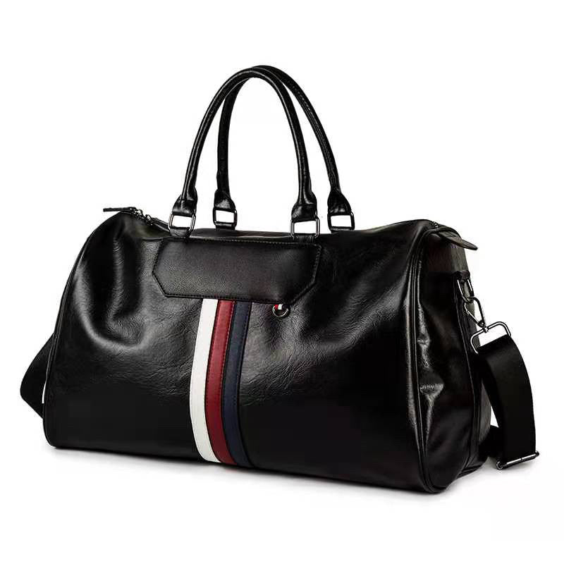 BMW leather-look duffel bag side view showing adjustable shoulder strap