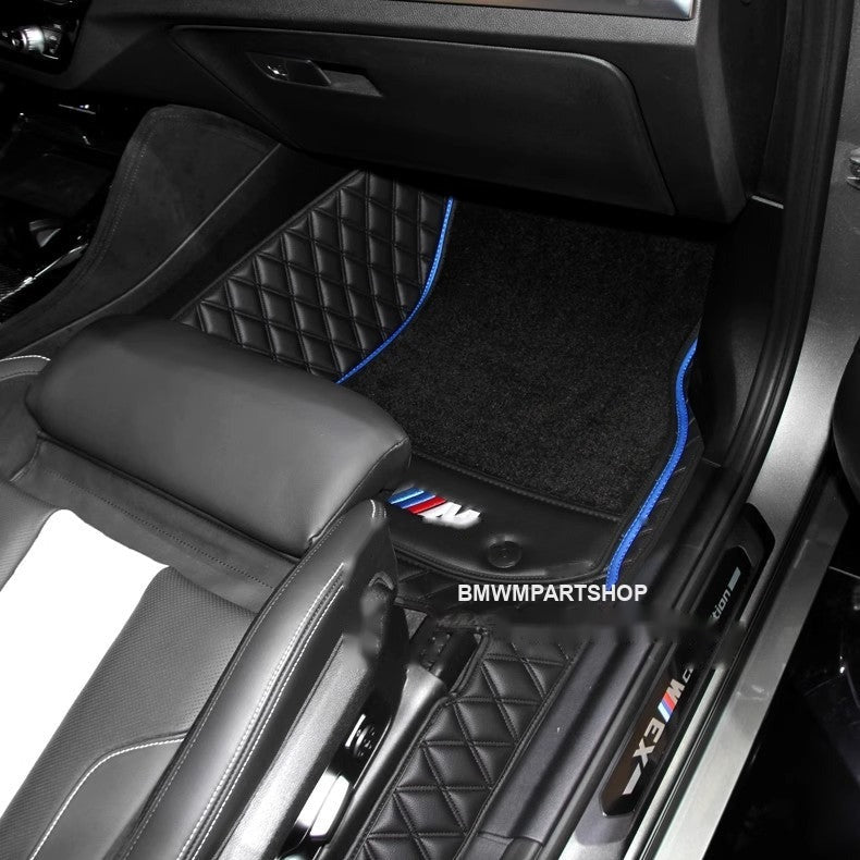 BMW custom floor mat installed in rear passenger footwell
