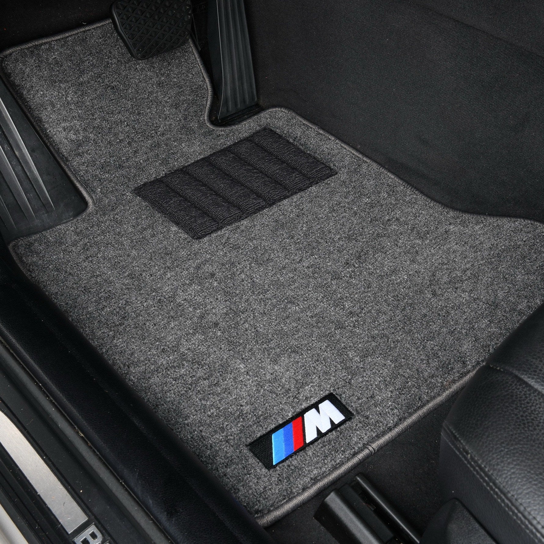 BMW light gray velvet driver's floor mat with M performance badge