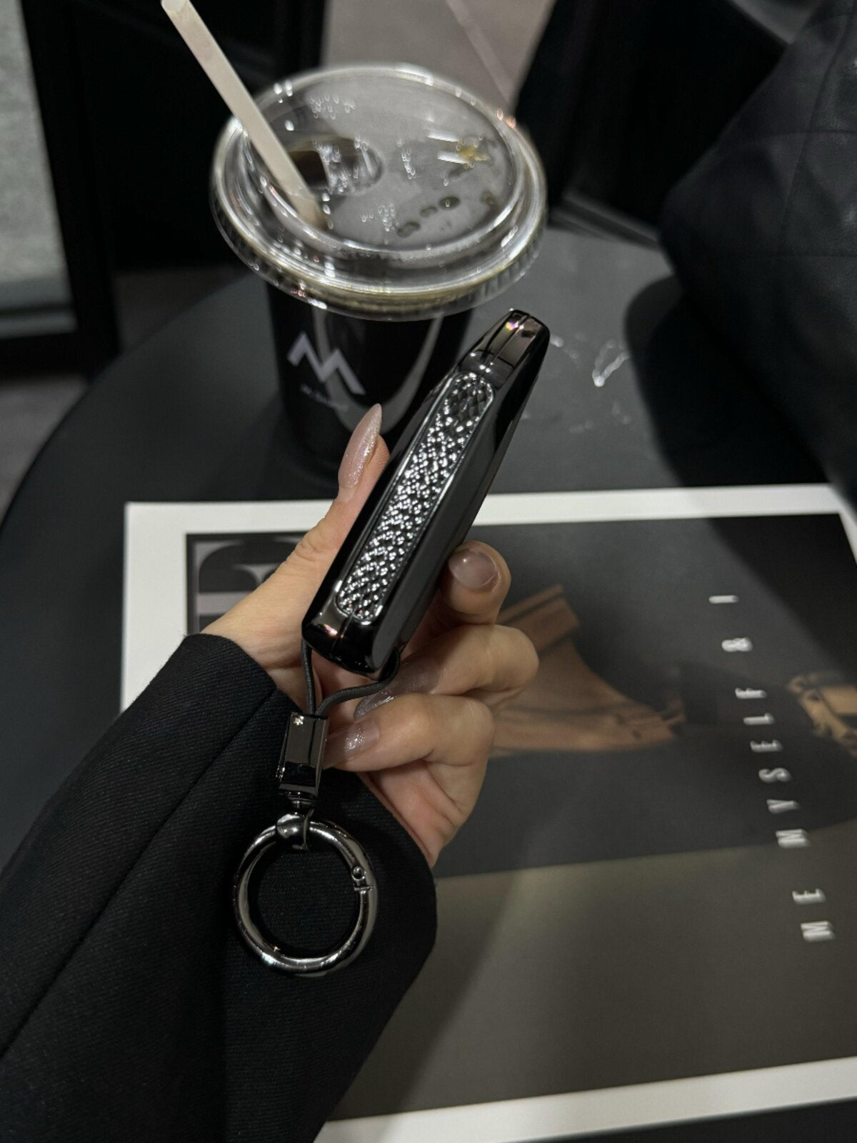 BMW G-Series key case in Phantom Black with chrome trim, top view