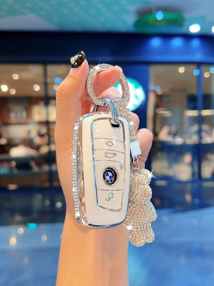 BMW diamond-studded cream white TPU key case with plush bear charm