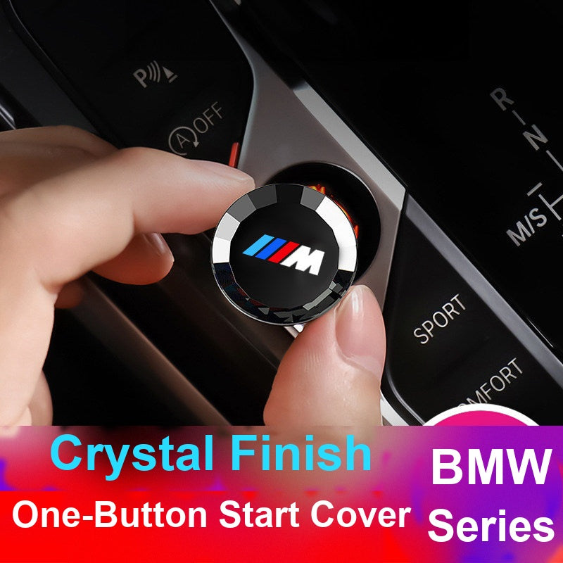 BMW crystal start-stop button being installed by hand