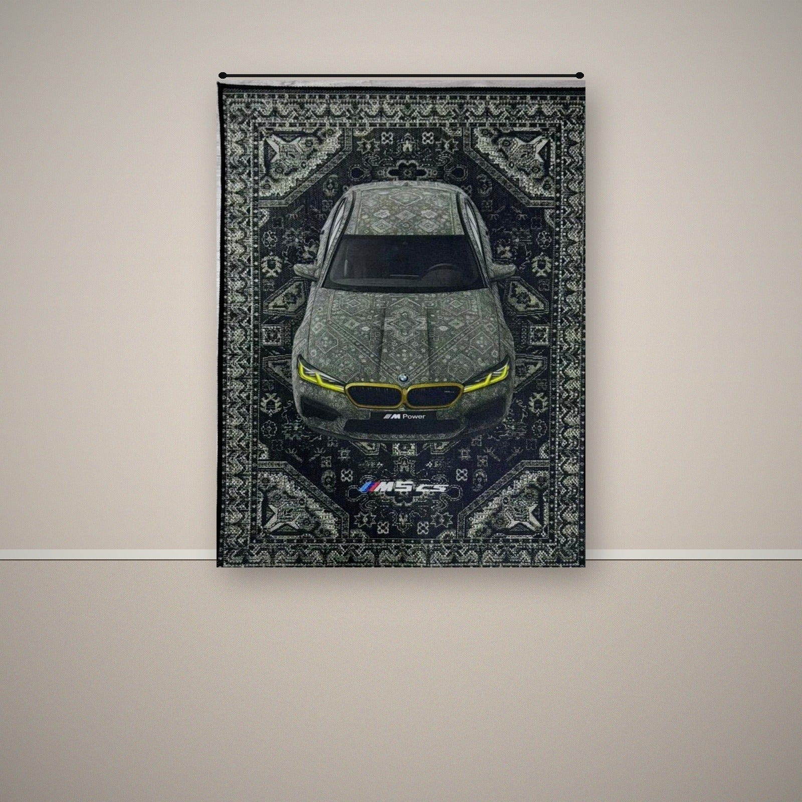 BMW M5 CS wall rug hanging in a soft cream bedroom setting