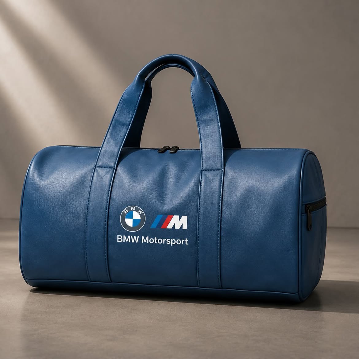 BMW Motorsport leather duffel bag in navy blue - front view