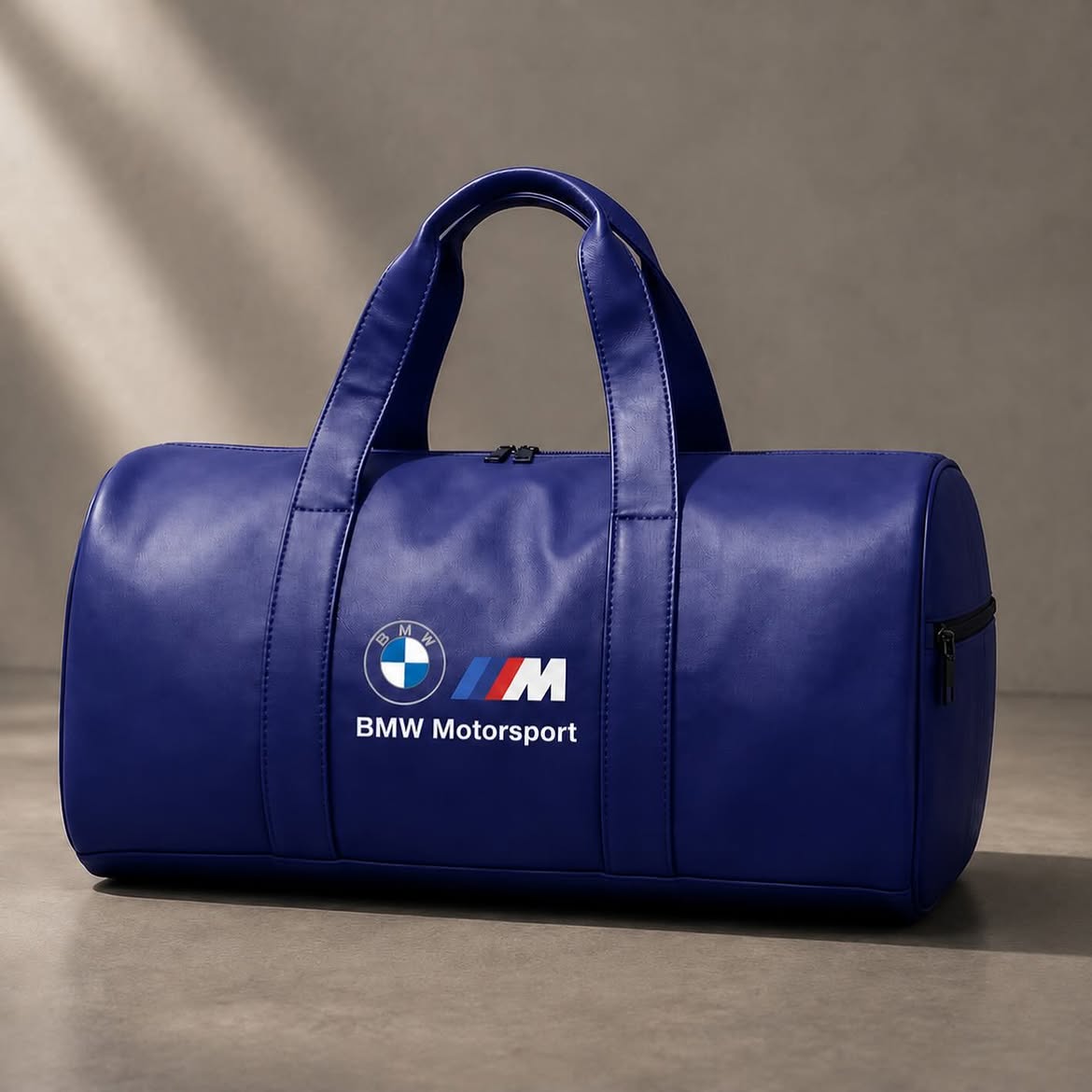 BMW Motorsport leather duffel bag in dark navy blue - front view